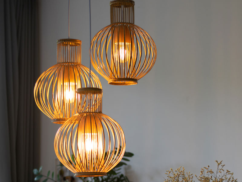 A rattan 3 light pendant is a lighting fixture that features three bulbs arranged within a rattan frame