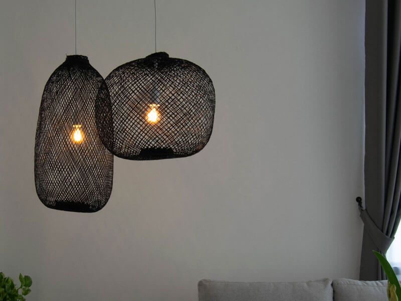 Black rattan pendant lights offer a unique blend of natural beauty and modern sophistication