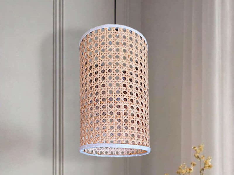 Cylindrical rattan pendant light fixtures add an earthy, organic vibe that suits both rustic and contemporary designs