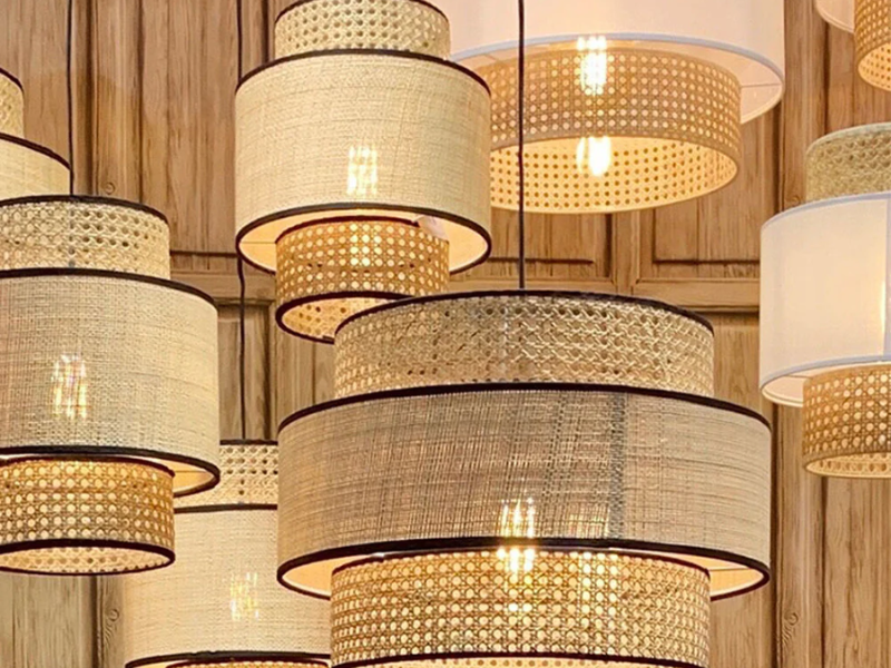 Cylindrical rattan pendant lights are not just visually striking