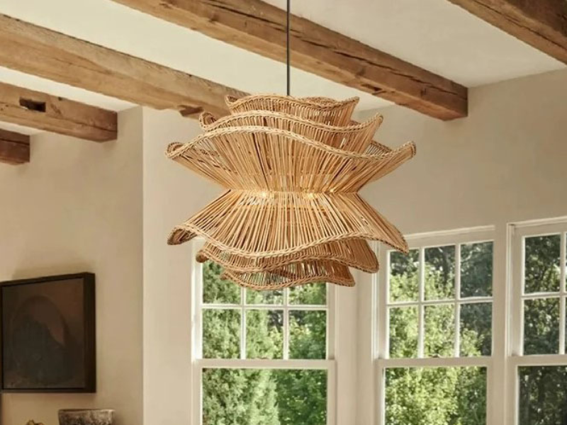 Pair the pendant light with natural wood furniture to complement the earthy tones of rattan